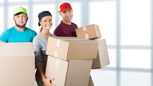 Packed boxes and furniture ready for a local house move