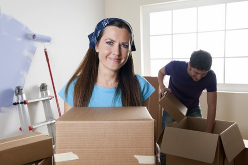Careful loading of furniture and boxes into a moving van