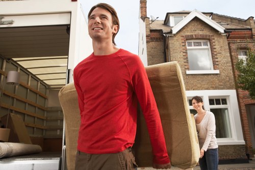 Loading furniture and boxes into a van for an Old Coulsdon customer