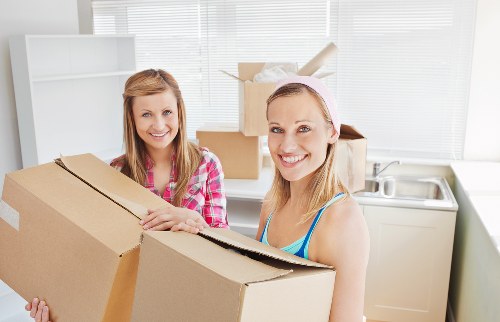 Packed boxes and furniture ready for home removals